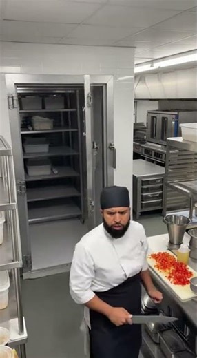 Restaurant cam catches walk-in fridge door opening by itself. Chef shocked.