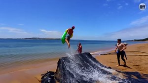 Epic beach slip and slide will have you dreaming of warmer weather