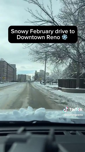 Enjoying the First Snowfall in Downtown Reno