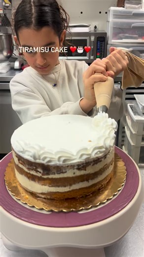 “When school is closed because of snow ❄️, Kate chooses the bakery. Little hands, big heart, and our famous tiramisù made with love at Dolce & Amaro 🤍✨”❤️☕️🇮🇹🎂#ncbakery #glutenfree #tiramisu #moderncake #passion #love ❤️ | Dolce&Amaro Artisan Bakery