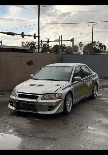 Getting ready to start paint and body work on a true legend. The iconic Mitsubishi Evo driven by Paul Walker in 2 Fast 2 Furious has officially arrived at Blue Auto Paint and Body. 🎨🔧 This isn’t just another project… this is one of the most recognizable JDM movie cars ever built. Our team is getting ready to bring this legend back to life and have it looking flawless for @FuelFest in Tampa. Stay locked in… because this restoration is going to be something special. #FuelFest #PaulWalker #FastAn