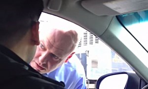New York police officer verbally abuses Uber driver - video