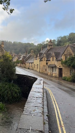 165K views · 9.8K reactions | Castle Combe is a small, picturesque village in Wiltshire, England. It’s often described as “the prettiest village in England.” It’s located in the Cotswolds Area of Outstanding Natural Beauty and is famous for its honey-colored stone cottages, medieval church, and tranquil atmosphere. #castlecombe #cotswoldsvillages #virals #beautifuldestinations #rainydays | Beauty of the World | Facebook