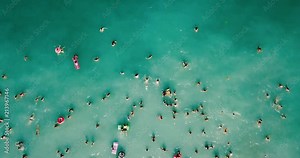 Aerial View From Flying Drone Of People Crowd Having Fun, Playing And Relaxing In Water At The Black Sea In Romania