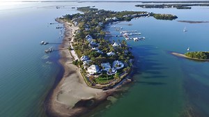 Naples-based Elite Jets allows use of its Useppa Island membership via helicopter