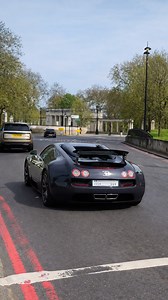 Iconic Bugatti Veyron rolling in traffic