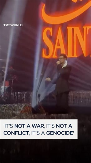 At a Doha concert, Palestinian-French singer Saint Levant called for a “free Palestine,” describing the war in Gaza as genocide. Having left Gaza at age 7 and grown up in Jordan, he reflected on his own experience as a Palestinian in exile and highlighted the resilience of Palestinian culture while condemning the ongoing violence against his people. | TRT World