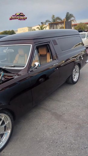 Check out this custom black Cherry Panel Van at https://youtube.com/live/9O9v1idL96U. From the gleaming chrome wheels to the finely crafted interior and powerful engine, it's a masterpiece of automotive design. Prepare to be impressed. #CustomVehicle #BlackCar #ChromeWheels #CarEnthusiast #DreamCar #holden #panelvan #aussiegaragelive #aussiegarage #holdenpanelvan #blackcherrypaint #custompanelvan #musclecars #customcars #classiccars #hkhthgnationals2025 #dirtydevilscarclub | Aussie Garage