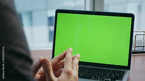 Businessman video calling green screen laptop sitting luxury office close up.