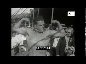 1920s, 1930s USA, Strongman Flexing His Muscles