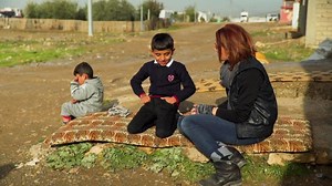 Kidnapped Yazidi boy raised by American ISIS mother