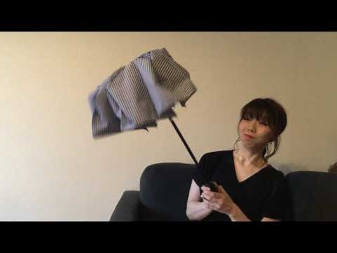 「hands＋ 自動開閉 超撥水折りたたみ傘」を開閉する様子