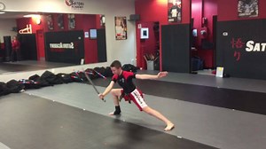 Sempai Megan demonstrating her Doces Pares form. | Satori Academy of Martial Arts NJ