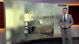 Video shows passengers evacuating from burning plane in Denver