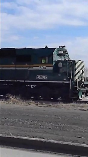 Driving next to a Hudson Bay Railway SD50 engine along Illinois riverfront #railroad #railfan