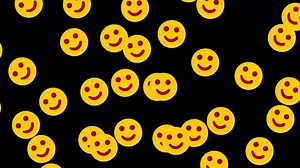yellow happy emojis on black background