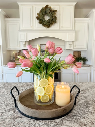 DIY spring centerpiece idea! 🍋🍋 Comment LINK and I’ll send you links to the tulips and the vases I used!😍 I love using lemons for spring and summer decor! They feel so fresh and warm! Who else is ready for spring and summer?! It’s going to be 71 here today and I’m so excited!☀️☀️#LTKhome #LTKit #forthehome#homedecor #kitchendecor #kitcheninspo #springdecor #springdecorating #diy #diyideas #easydiy #springdiy #springdecorations #diyspring #lemondecor | Our Winton home