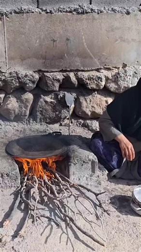 Cooking up some traditional flavors over an open flame 🔥🍳 #RusticCooking #GrillVibes | Village Cooking