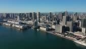Aerial view of cityscape of Tokyo at sunrise, waters of Tokyo Bay and...