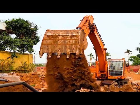 Doosan excavator, wheel loader, dump truck in operation