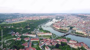 Beautiful panoiramic aerial view of the Prague city from above with the old town and Vitava river. Amazing city landscape footage.