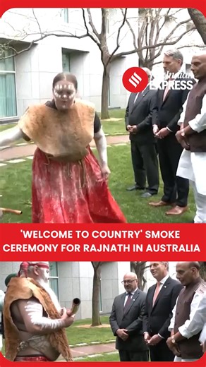 Defence Minister Rajnath Singh was welcomed today (Oct 9) to the Australian Parliament with a traditional Aboriginal “Welcome to Country” smoke ceremony. Rajnath Singh’s visit to Canberra aims to advance India-Australia defence and strategic cooperation. The ceremony highlights shared values and traditions, while his trip underscores the growing momentum in bilateral ties and both nations’ commitment to a free, open, and secure Indo-Pacific region. | Indian Express