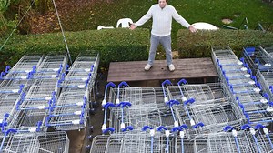 Ex-Tesco worker collects 65 dumped shopping trolleys & stores them in garden