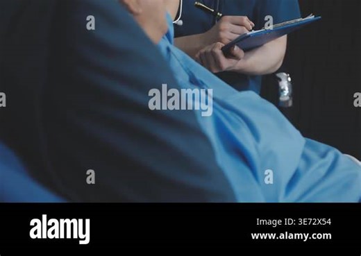 close up of doctor 's hand holding clipboard with stethoscope Stock Video Footage - Alamy