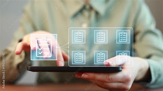 Person using a tablet to manage tasks and checklists in a modern work environment.