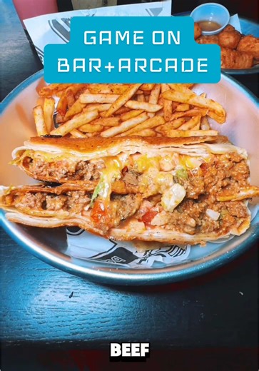 @GameOn bar arcade #bigschlimsreviews #games #food #cocktails #fun I love the old school arcade, bar, & food spot concept!! So when I saw this spot a while back, it was a matter of time until I pulled up!! Let’s go see what they’re hittin on!! . Where I am: @gameondc . Location Reviewed: 1330 U st., N.W. Washington D.C. . Items Reviewed: STAMP!! Their Sloppy Dog Glizzy ($12 an all beef hot dog with a cheese blend, onions, beef Sloppy Joe, & Old Bay fries). The Sloppy Joe on this glizzy was nosta