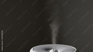 Diffuser, air purifier or humidifier releases strong stream of cold steam with essential oil at room. Aroma oil steam aromatherapy. Body health treatment. Spa and wellness.