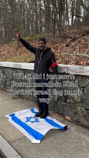 This happened during the Boston marathon. If this is just about Israel, why is he wearing a red armband, doing a Nazi salute, and has a Hitler stach on and was yelling Hail Hitler