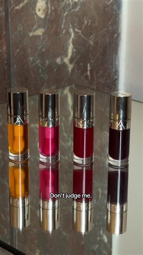What's in her bag? We asked @its.juliechen to show us. Blush, phone, and... one Lip Comfort Oil. And another. And another. We're not judging. We're taking notes. When the formula is this good, one shade is never enough.​ Which Lip Comfort Oil shade are you obsessed with?​ ​ #LipObsession #Clarins #LipOil