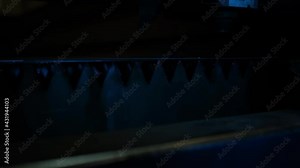 CNC machine cuts metal and sparks. Plasma cutting of metal. A plasma cutter cuts a workpiece from a sheet of metal in production.