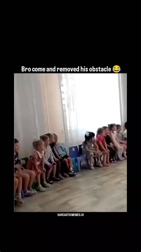 Sarcasticmemes.io on Instagram: "The video captures a masterclass in "problem-solving": ​The Situation: A young girl is sitting next to a boy who clearly wasn't the "intended" neighbor. ​The Intervention: Another boy in a red shirt walks in with absolute confidence, picks up the blue chair (child and all), and relocates the "obstacle" a few feet to the right. ​The Result: He secures his spot right next to the girl, who immediately gives him a hug. ​The Art of the Hustle ​This kid isn't playing b