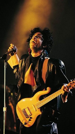 Vintage Recordings on Instagram: "Prince’s performance of “While My Guitar Gently Weeps” at George Harrison’s Rock & Roll Hall of Fame induction in 2004 is nothing short of iconic. This clip catches the back half of his solo — the moment everything catches fire. Prince glides to the front of the stage like it’s effortless, bending notes that sing, cry, and soar, then unleashing sharp, fluid runs that feel both wildly free and perfectly precise. Every phrase rises, slices through the air, and lan