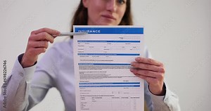 Woman agent showing how to fill out insurance form closeup 4k movie slow motion