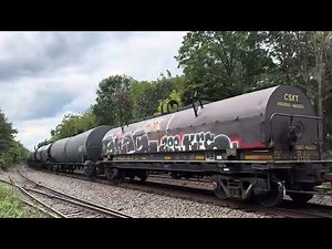 CSX 5260 ES40DC leads CSX M404 through Piscataway with CSX 9004 Dash9