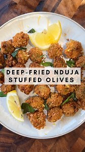 #AD Deep-Fried Nduja Stuffed Olives! 🫒 👨‍🍳: @tomjustcooks Craving a savory delight that’s crispy on the outside and bursting with flavor on the inside? Try our Deep-Fried Nduja Stuffed Olives – the perfect combination of creamy, spicy, and zesty! Instructions: 1️⃣ Begin by finely chopping the basil and placing it in a bowl with cream cheese, nduja sausage, lemon zest, lemon juice, salt, and pepper. Mix until the sausage is fully incorporated, ensuring it’s easy to pipe into the olives. 🧀🍋 2
