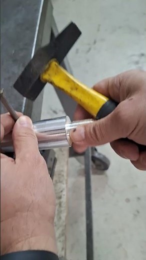 remove roll pin using a hammer