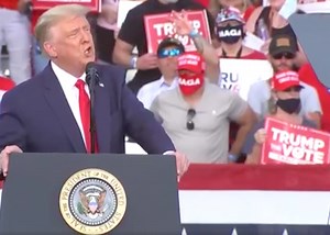 Fury as Trump fan appears to flash ‘white power’ gesture behind president
