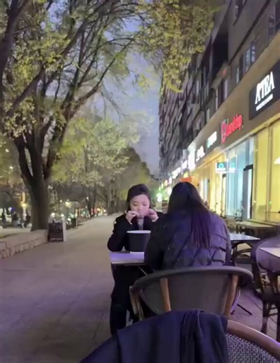 She’s filming her best friend, who can’t see anything without her glasses, sitting at the wrong table. 😂😂