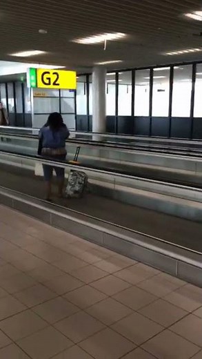 [FUNNY] Woman walking WRONG WAY on the Moving Walkway