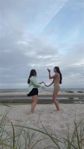 Playful Beach Moments: Dancing on Sand in Denmark