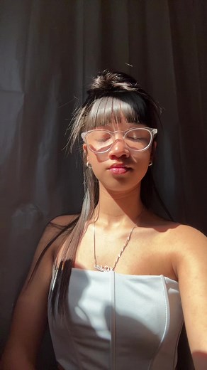 Stylish Long Hair Look with Clear-Framed Glasses