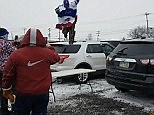 Buffalo Bills fan snaps his leg after jumping through a table