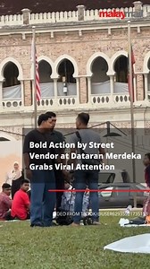Upset with enforcement officers, a street vendor threw his goods in protest, leaving onlookers stunned and sparking widespread debate online. | Malay Mail