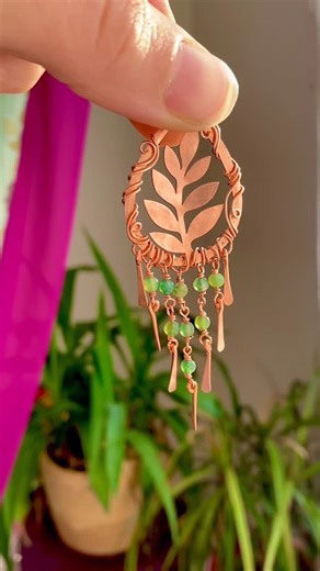 Wire Wrapped Crystal Jewelry ~ by Abbey on Instagram: "What do you think? Should I turn this into earrings or a necklace? 🌿 Here’s a peek at my most recent laser project with my Xtool F2 Ultra! I didn’t quite get to finish this before we left on holiday but here’s what I have so far and I’m loving the fairy nature vibes in this design! I’m still away for the holidays but I can’t wait to get back to my studio to finish these beauties and to see what other magic I can create with my Xtool laser �