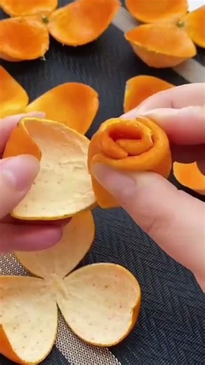 make flower shapes using unused orange peels that can be made into them