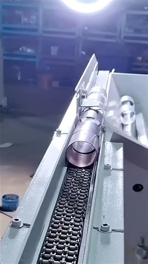 Round tube elevator, round tube feeder, round tube processing machine